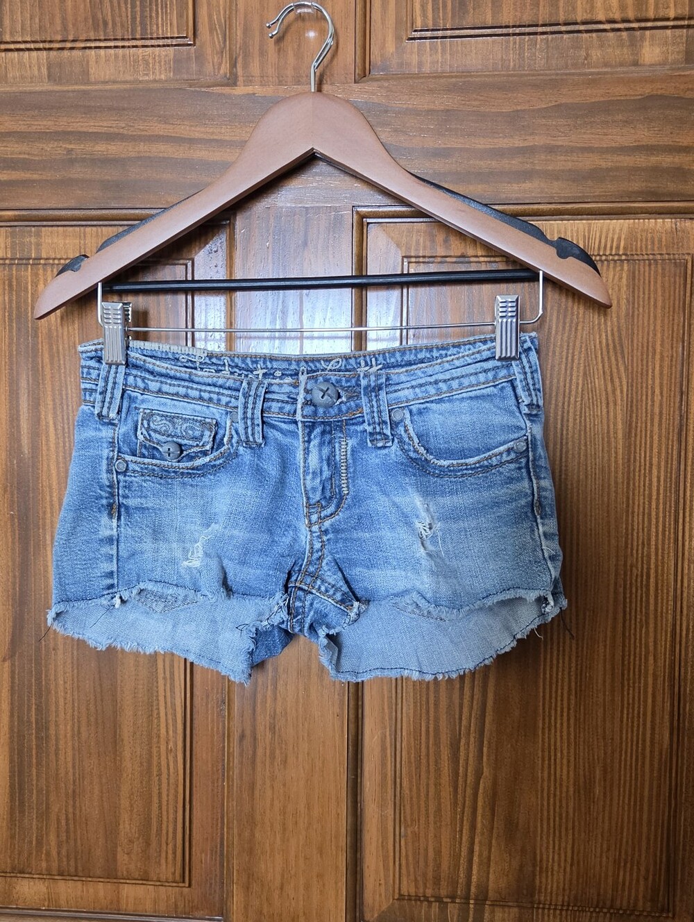 Low-Rise Distressed Blue Denim Cutoff Shorts